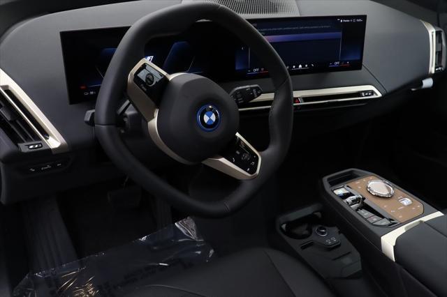 new 2024 BMW iX car, priced at $102,570