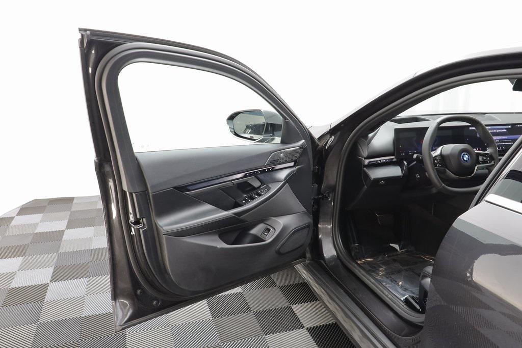 used 2025 BMW i5 car, priced at $61,977