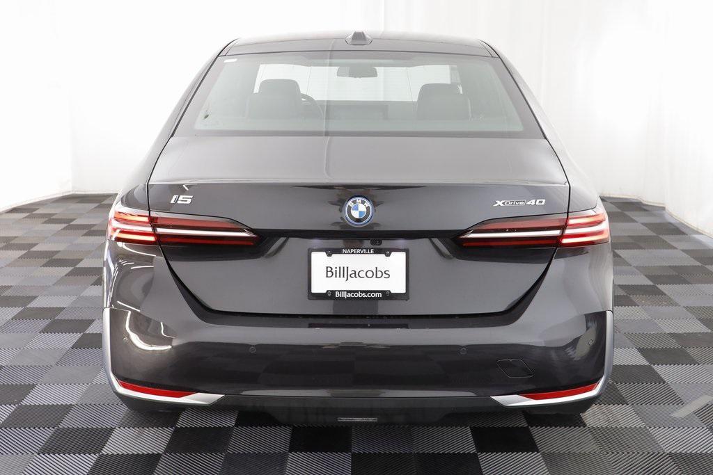 used 2025 BMW i5 car, priced at $61,977