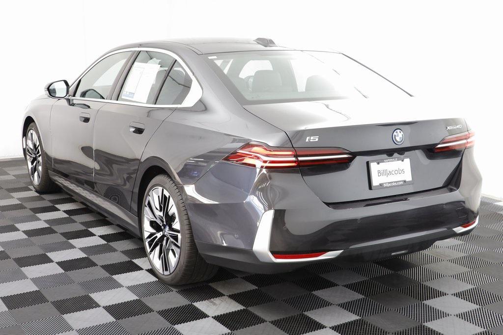 used 2025 BMW i5 car, priced at $61,977