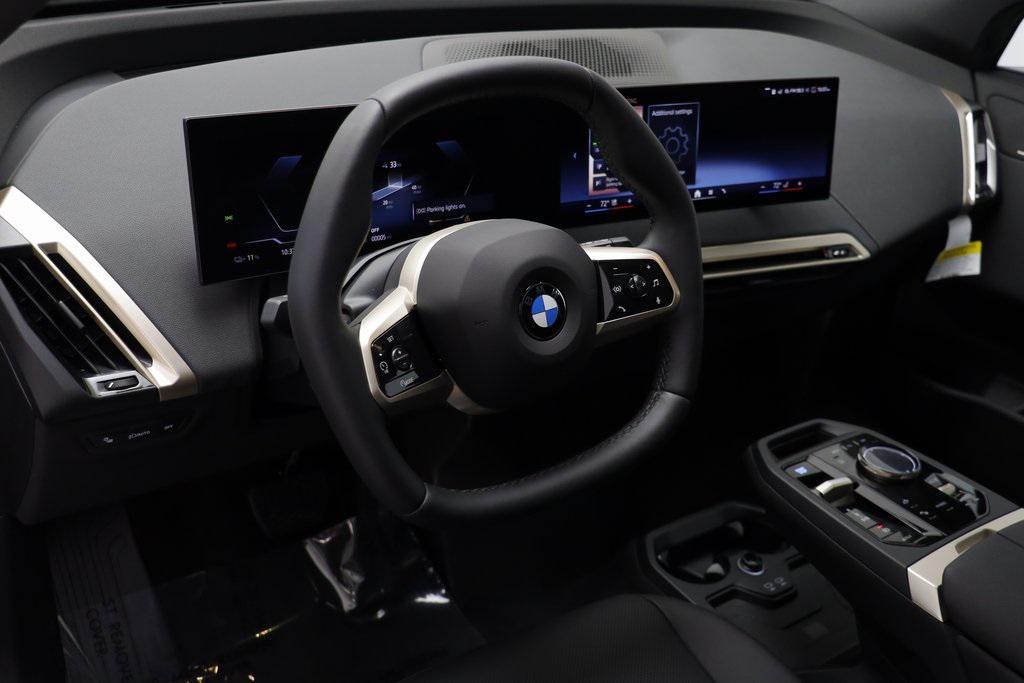 new 2026 BMW iX car, priced at $83,370