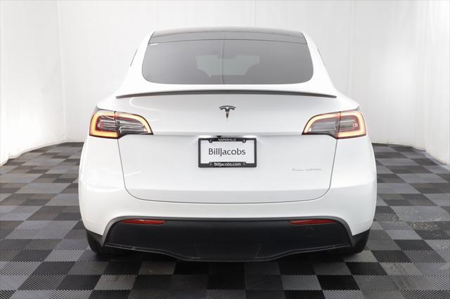 used 2023 Tesla Model Y car, priced at $27,577