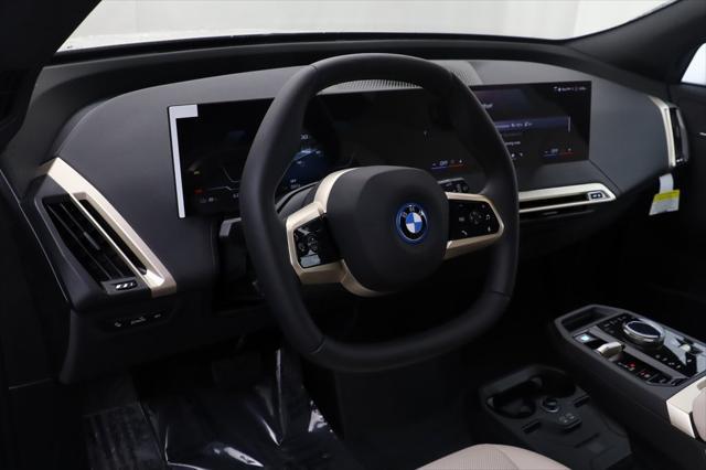 new 2024 BMW iX car, priced at $98,470