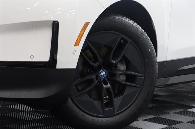 new 2024 BMW iX car, priced at $88,260