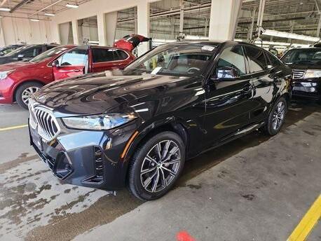 used 2024 BMW X6 car, priced at $75,877