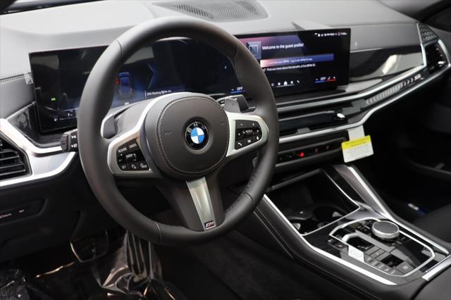 new 2025 BMW X6 car, priced at $78,275