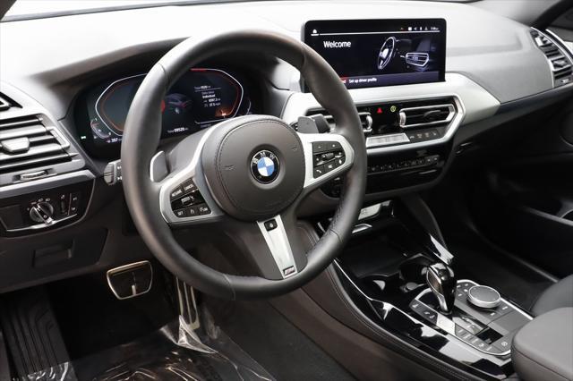 used 2025 BMW X4 car, priced at $57,577