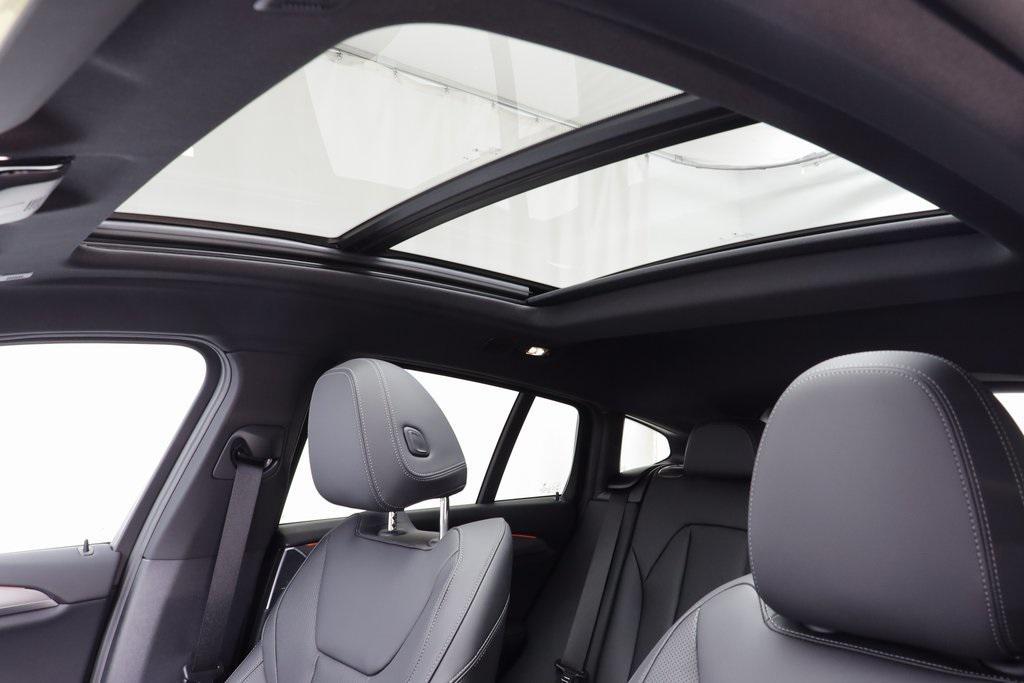 new 2025 BMW X4 car, priced at $61,185