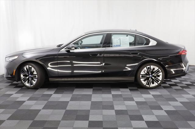 used 2025 BMW i5 car, priced at $68,977