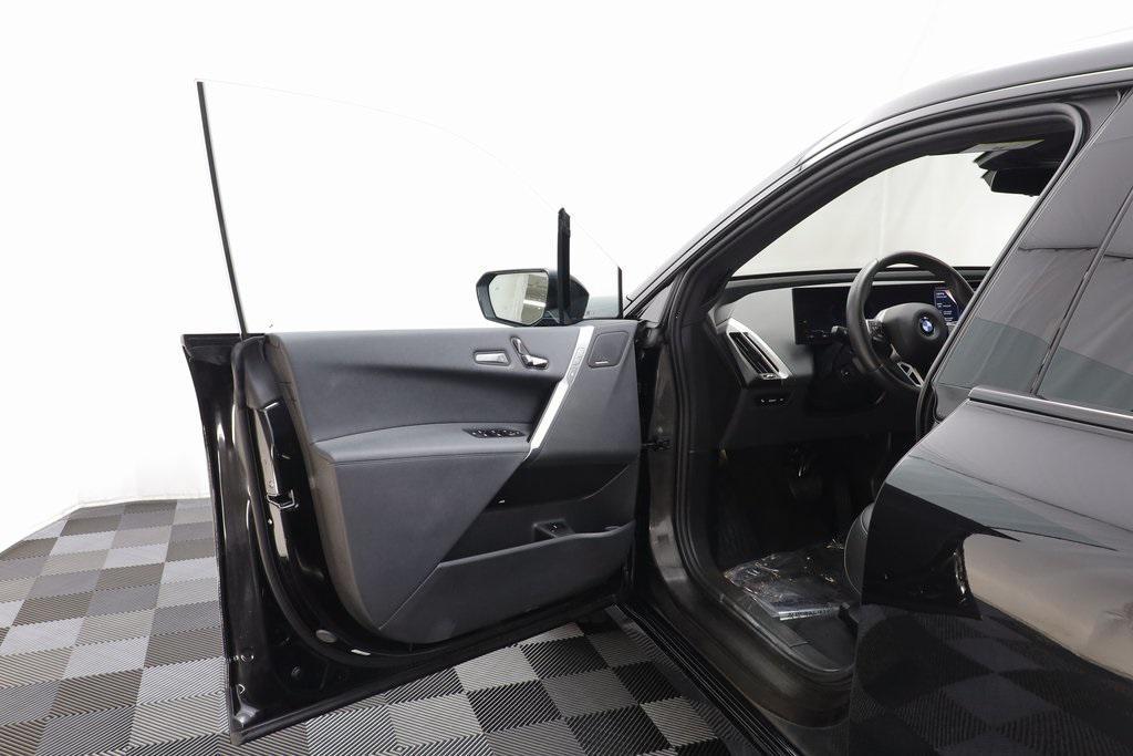 used 2025 BMW iX car, priced at $73,977
