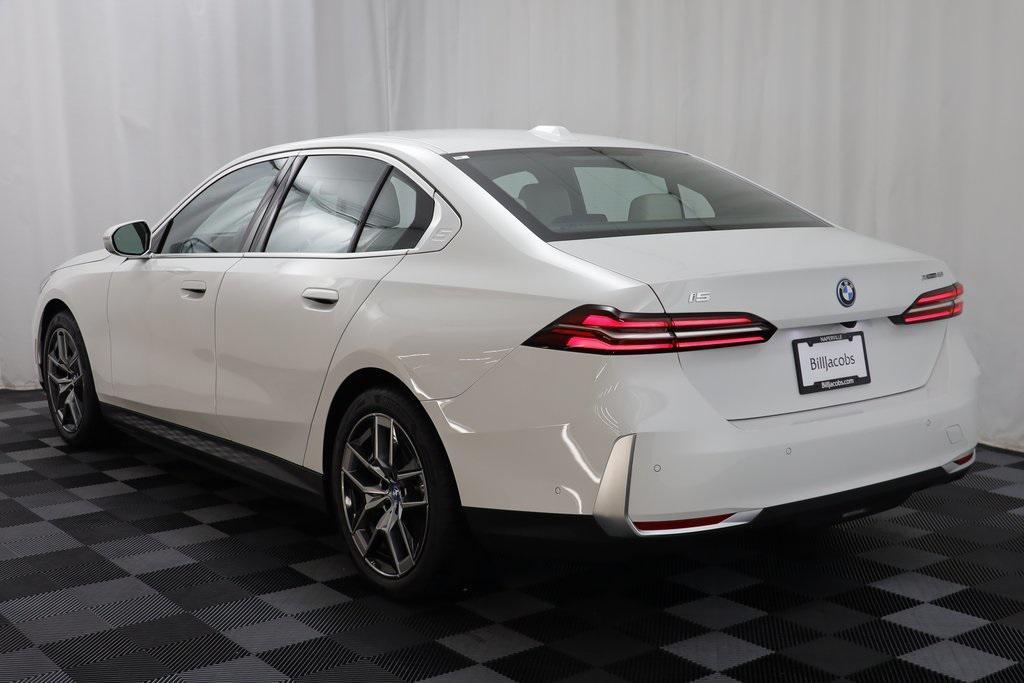 used 2025 BMW i5 car, priced at $63,977