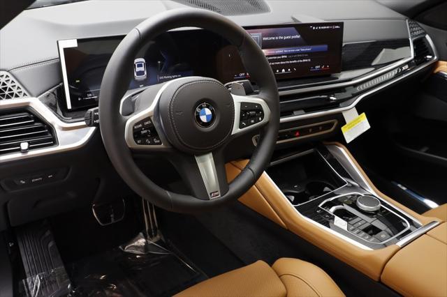 new 2025 BMW X6 car, priced at $77,875