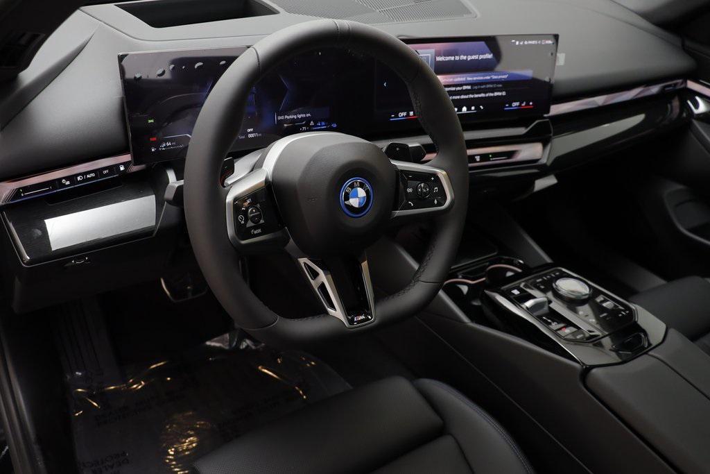new 2026 BMW 550e car, priced at $79,390