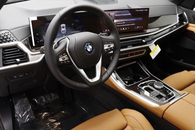 new 2025 BMW X5 PHEV car, priced at $76,195