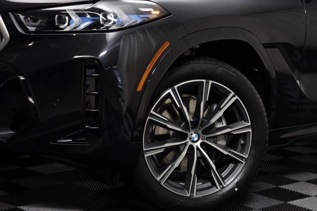 new 2025 BMW X6 car, priced at $77,895