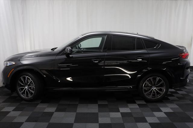 new 2025 BMW X6 car, priced at $77,895