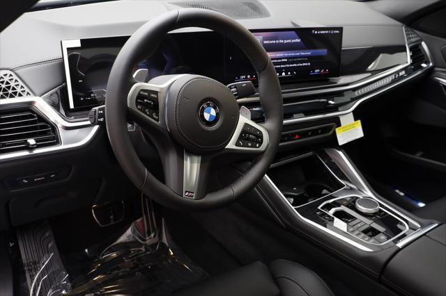 new 2025 BMW X6 car, priced at $77,895