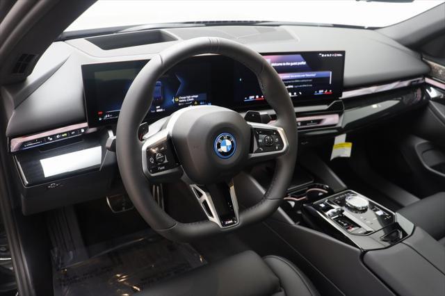 new 2025 BMW 550e car, priced at $83,975