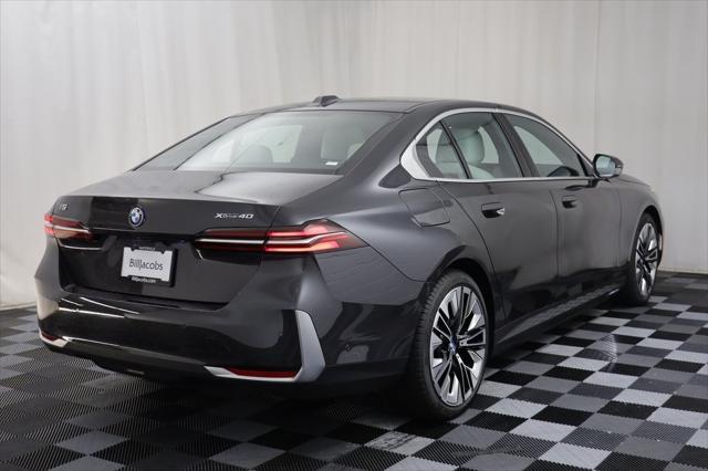 used 2025 BMW i5 car, priced at $68,977
