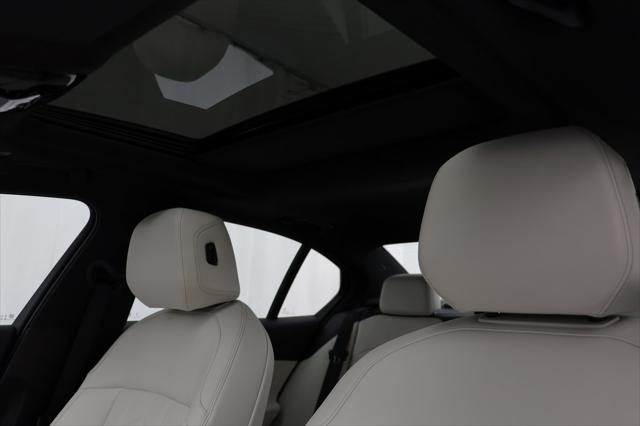 used 2025 BMW i5 car, priced at $68,977