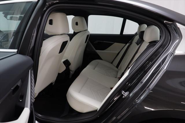 used 2025 BMW i5 car, priced at $68,977