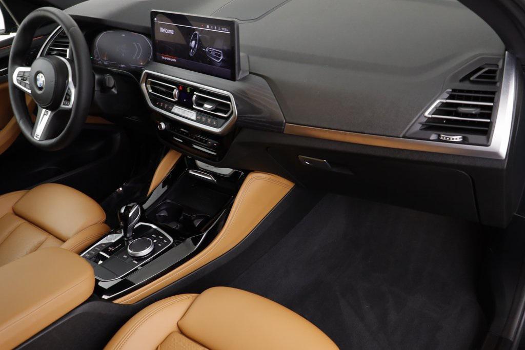 used 2023 BMW X4 car, priced at $45,577