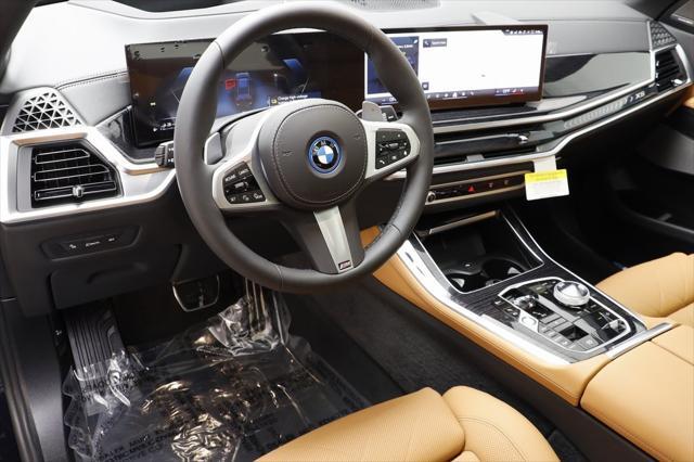 new 2025 BMW X5 PHEV car, priced at $88,925