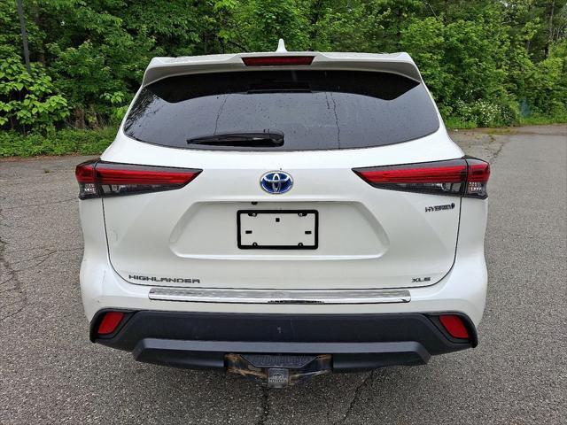used 2021 Toyota Highlander Hybrid car, priced at $32,128