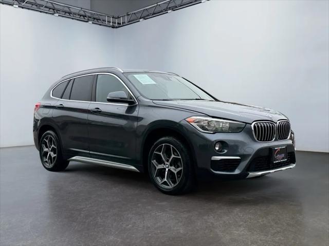 used 2018 BMW X1 car, priced at $12,994