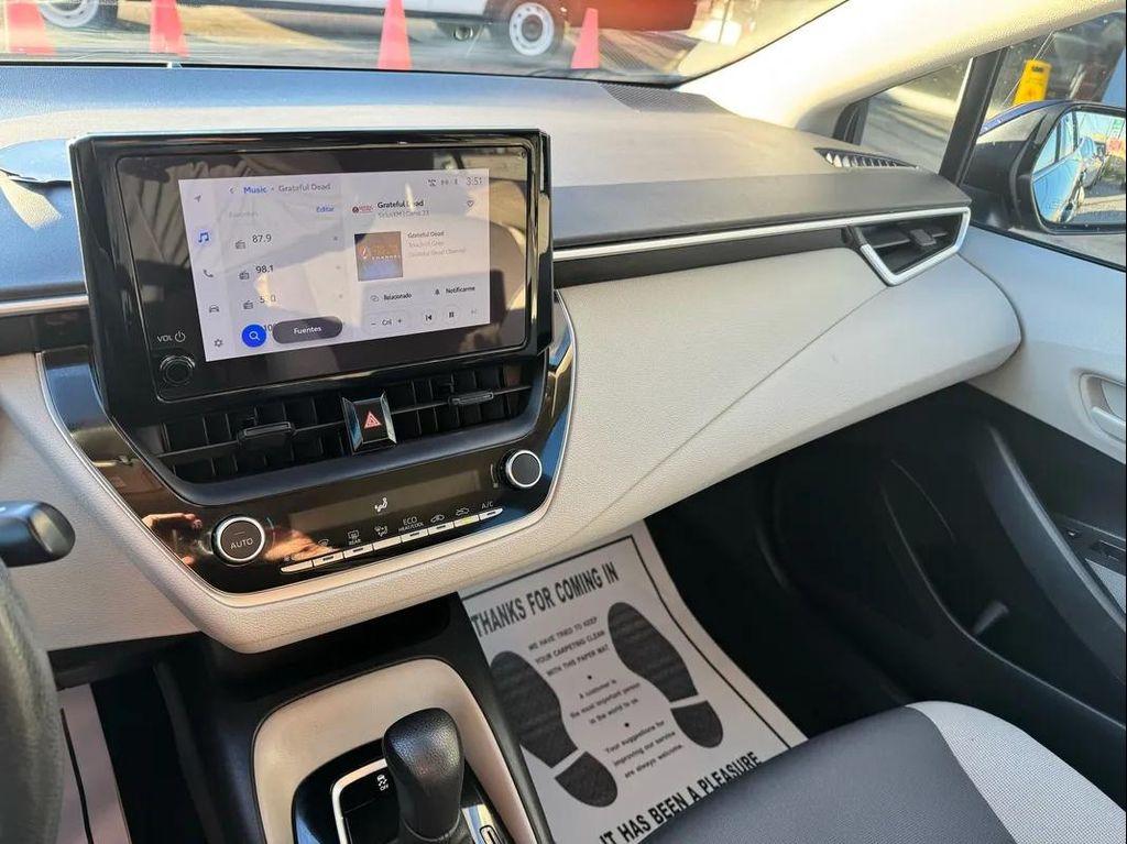 used 2023 Toyota Corolla car, priced at $15,994