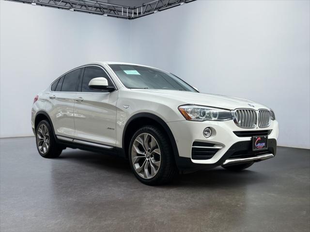used 2018 BMW X4 car, priced at $21,495