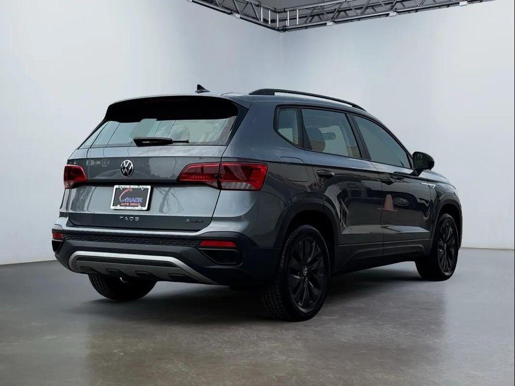 used 2022 Volkswagen Taos car, priced at $15,494