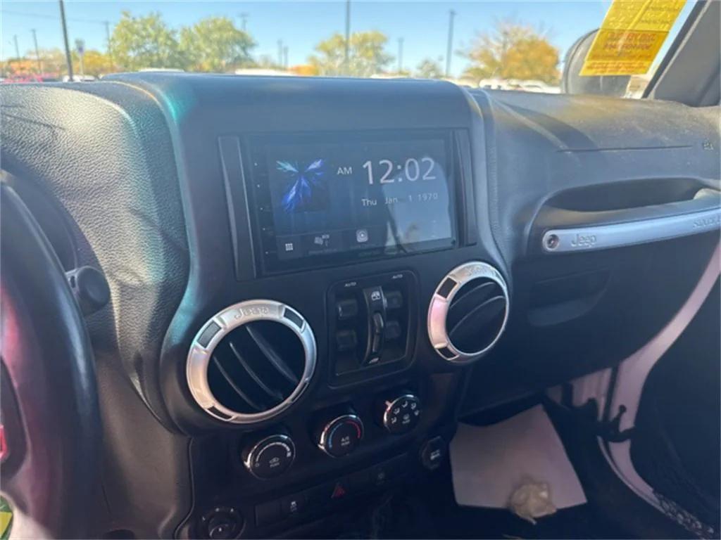 used 2015 Jeep Wrangler Unlimited car, priced at $16,999