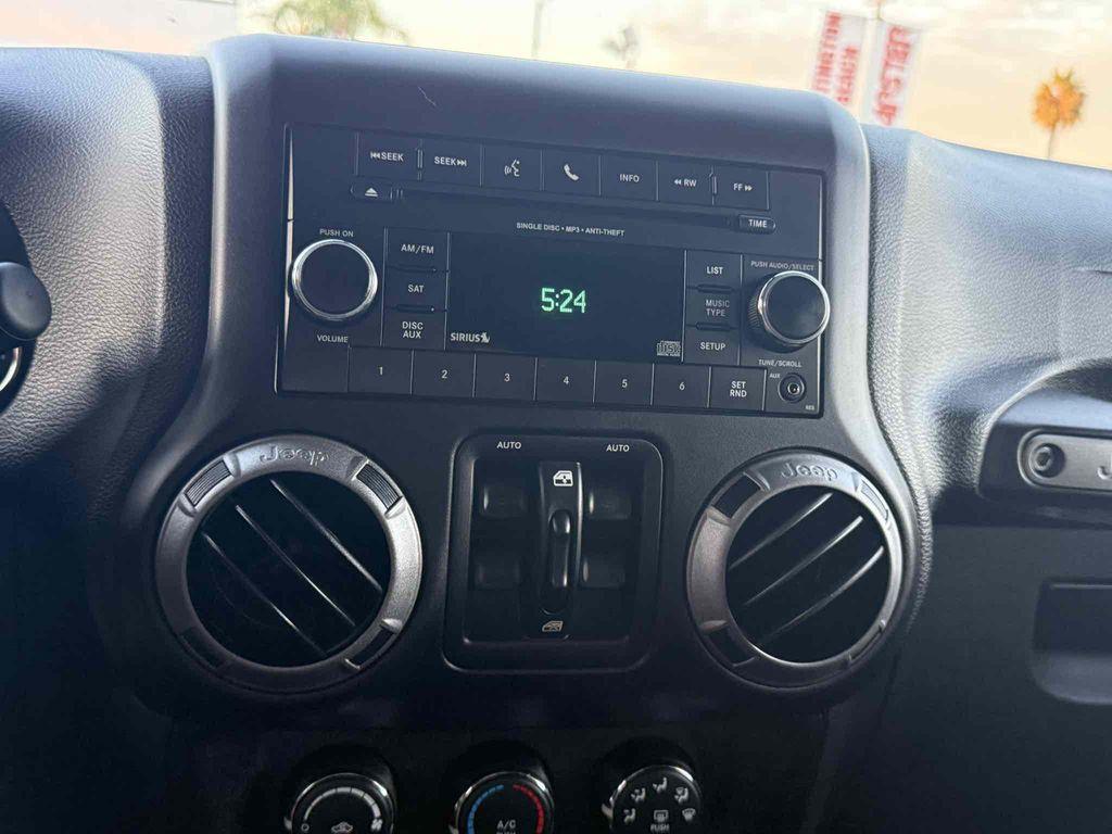 used 2015 Jeep Wrangler Unlimited car, priced at $19,987