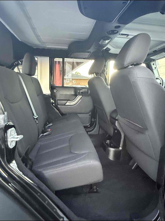 used 2015 Jeep Wrangler Unlimited car, priced at $19,987