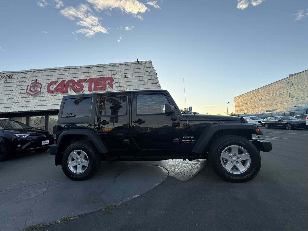 used 2015 Jeep Wrangler Unlimited car, priced at $19,987