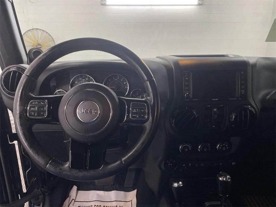 used 2014 Jeep Wrangler Unlimited car, priced at $16,990