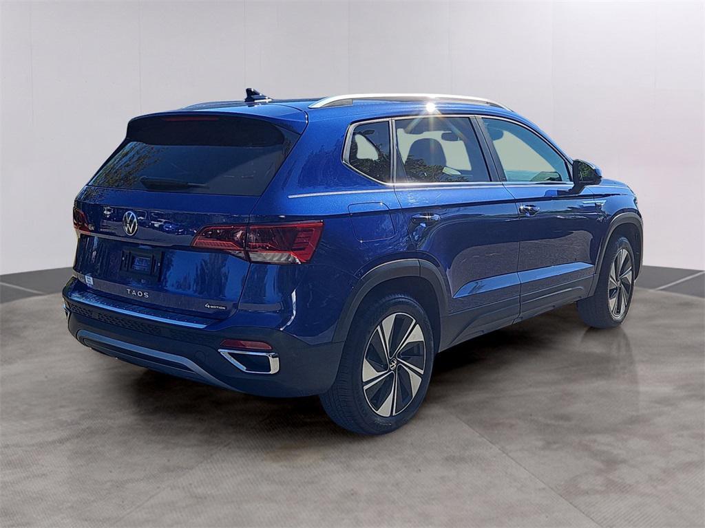 used 2024 Volkswagen Taos car, priced at $23,787