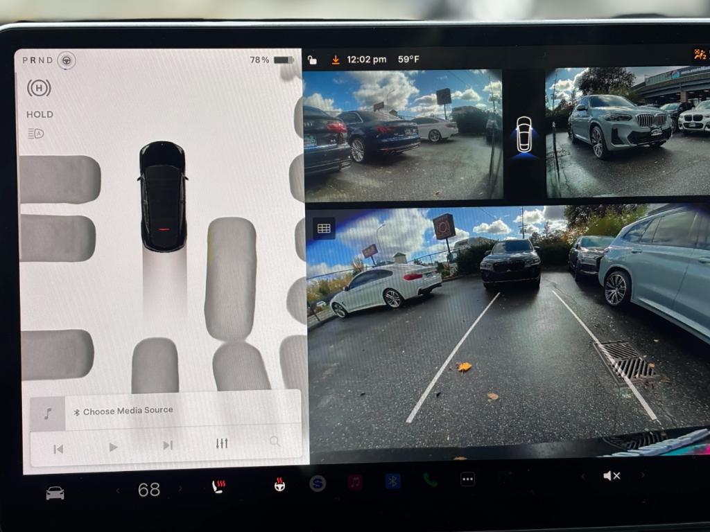 used 2023 Tesla Model Y car, priced at $34,450