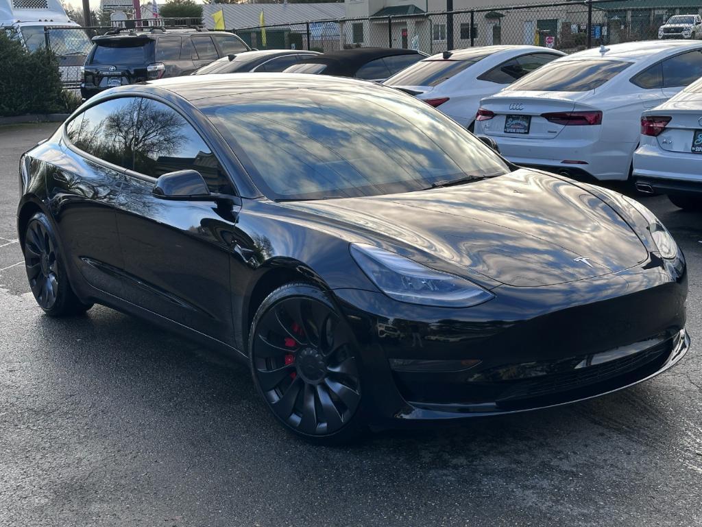 used 2023 Tesla Model 3 car, priced at $33,415