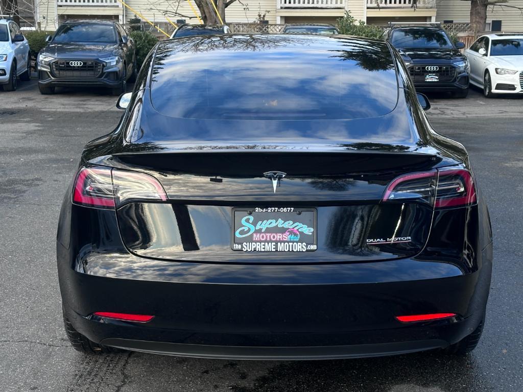 used 2023 Tesla Model 3 car, priced at $33,415