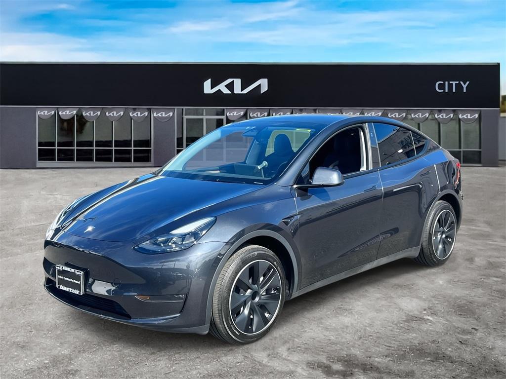 used 2024 Tesla Model Y car, priced at $31,597