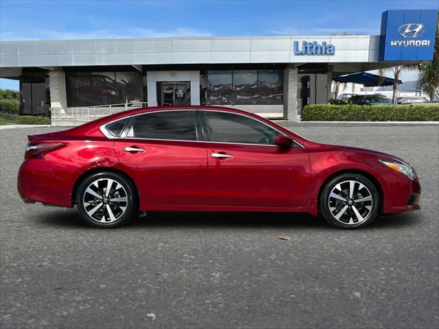 used 2018 Nissan Altima car, priced at $8,999