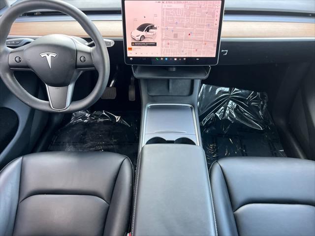 used 2023 Tesla Model Y car, priced at $28,499