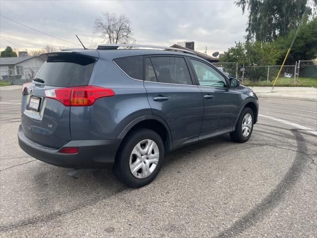 used 2013 Toyota RAV4 car, priced at $10,999