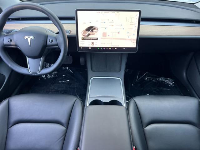 used 2023 Tesla Model 3 car, priced at $24,499