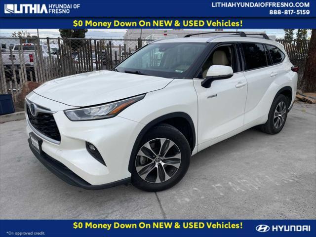 used 2020 Toyota Highlander Hybrid car, priced at $27,999