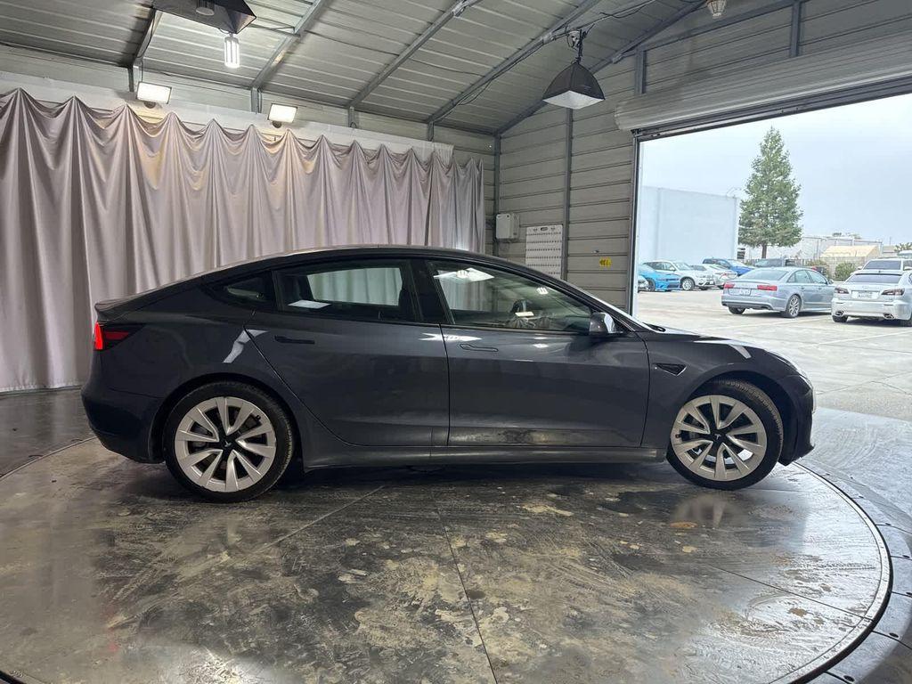 used 2022 Tesla Model 3 car, priced at $23,999