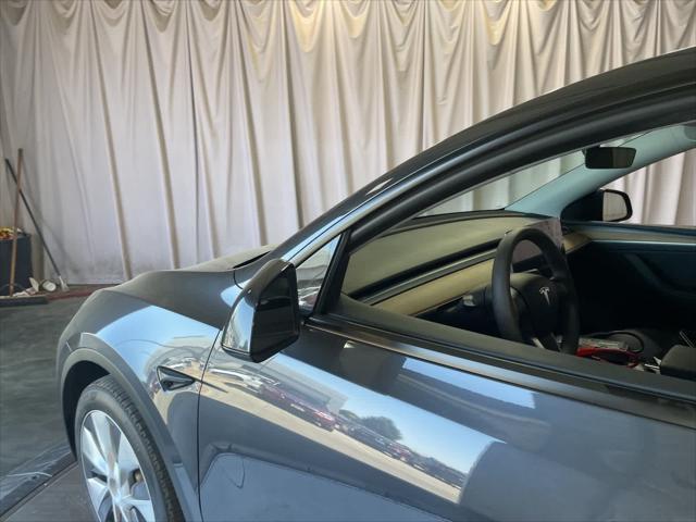 used 2024 Tesla Model Y car, priced at $34,449