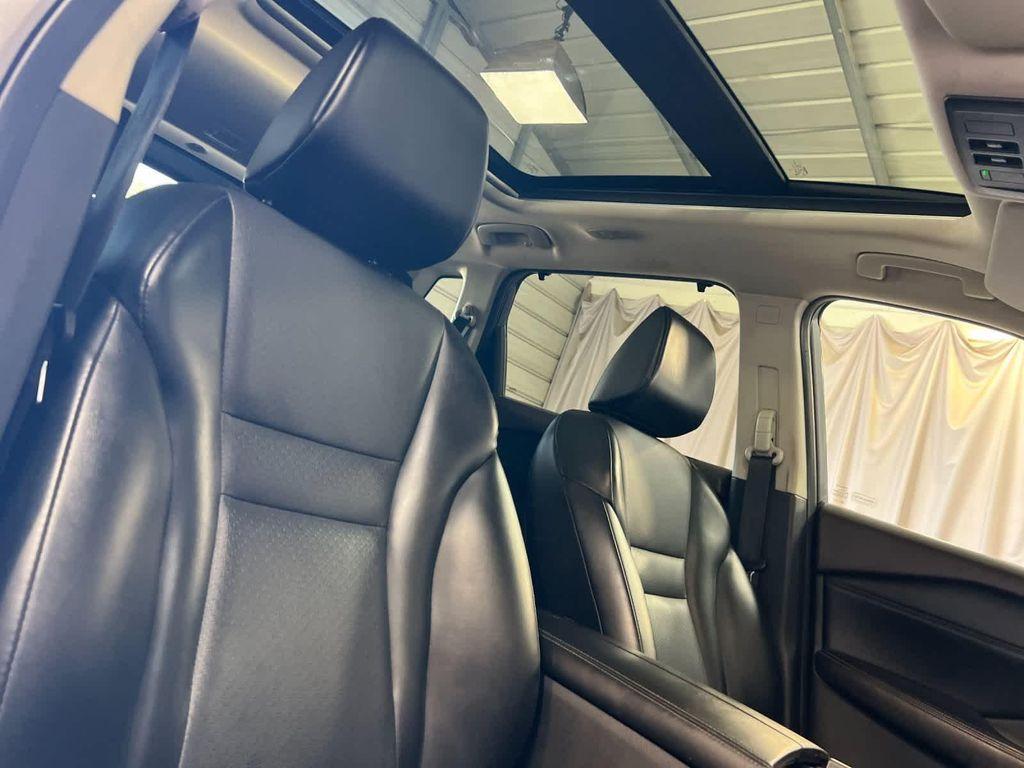 used 2021 Nissan Rogue car, priced at $15,999